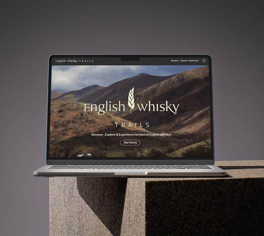 English Whisky Trails Project Graphic showing the new visual identity on a laptop mockup