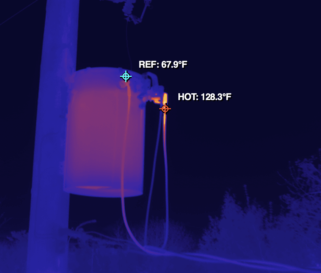 a thermal image taken from a DJI drone of a pole mounted transformer