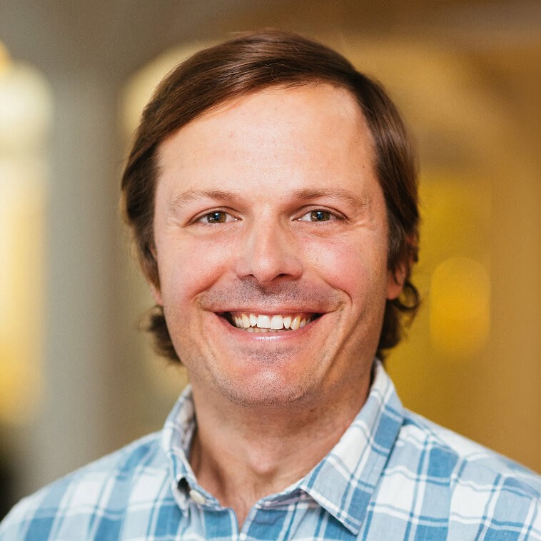 Portrait of Sam, Chief Commercial Officer