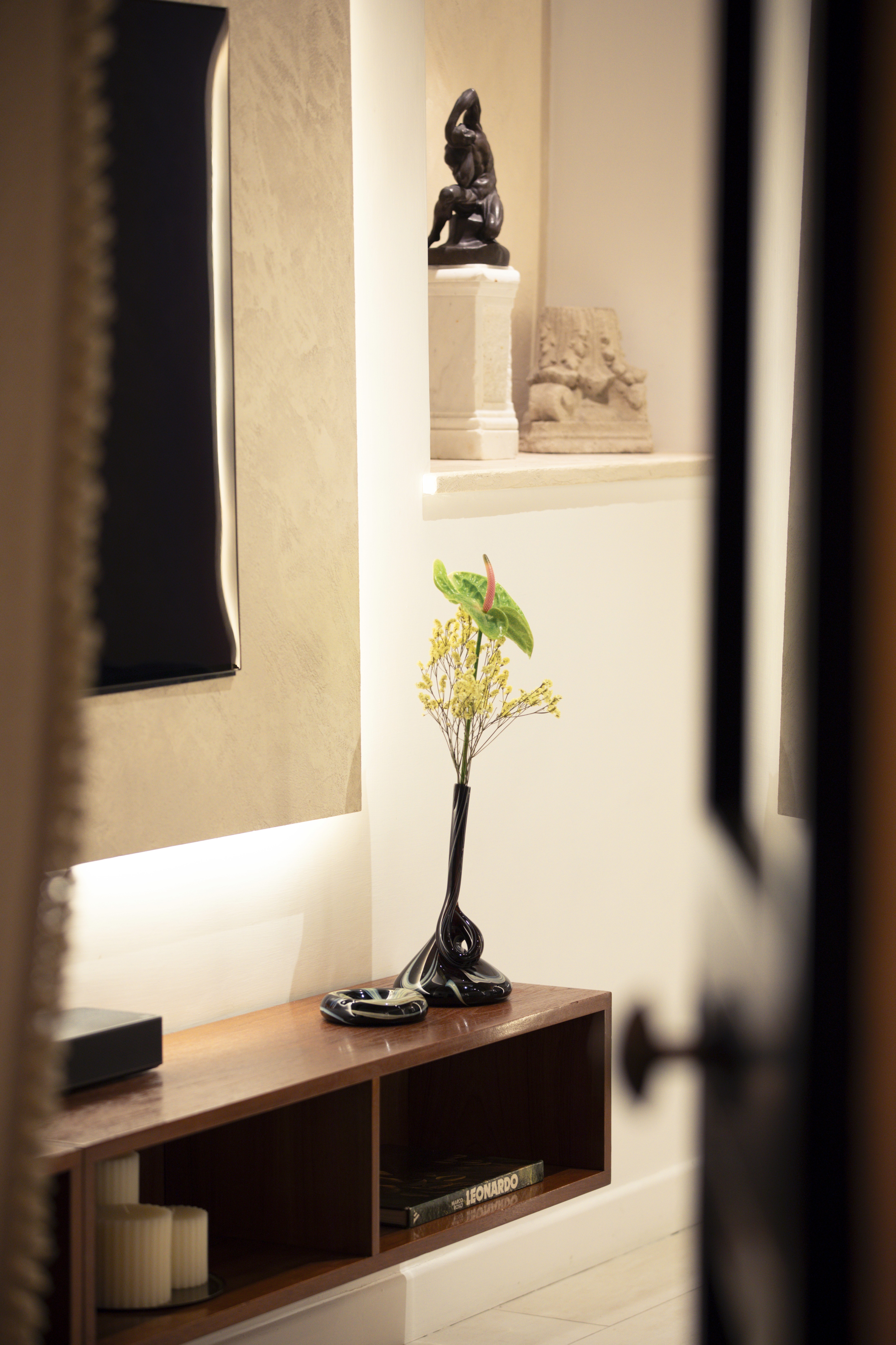 A brown traditional spiral staircase ascending in a classic style.