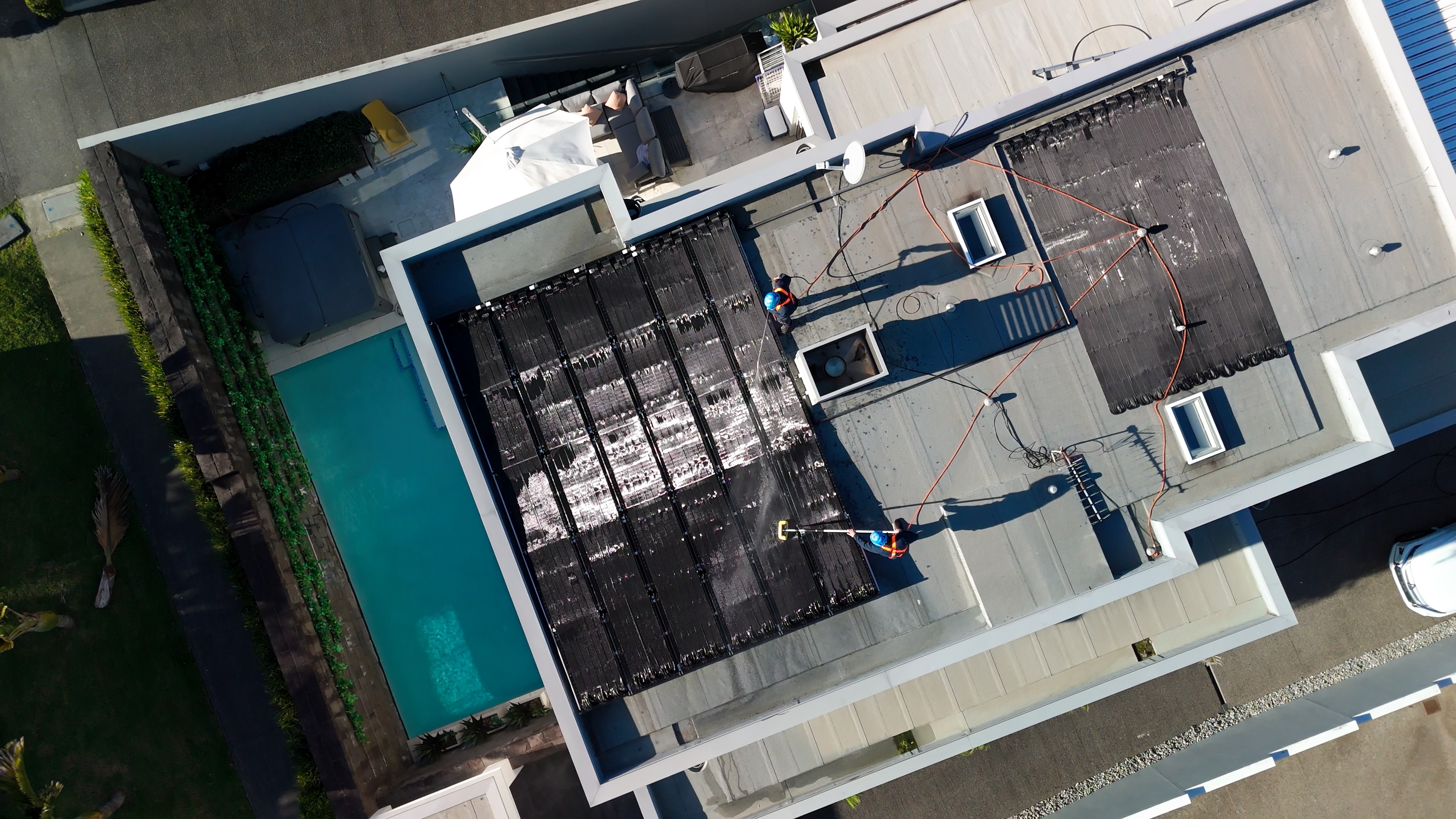 Aerial drone shot of a Clean Properties exterior cleaning job