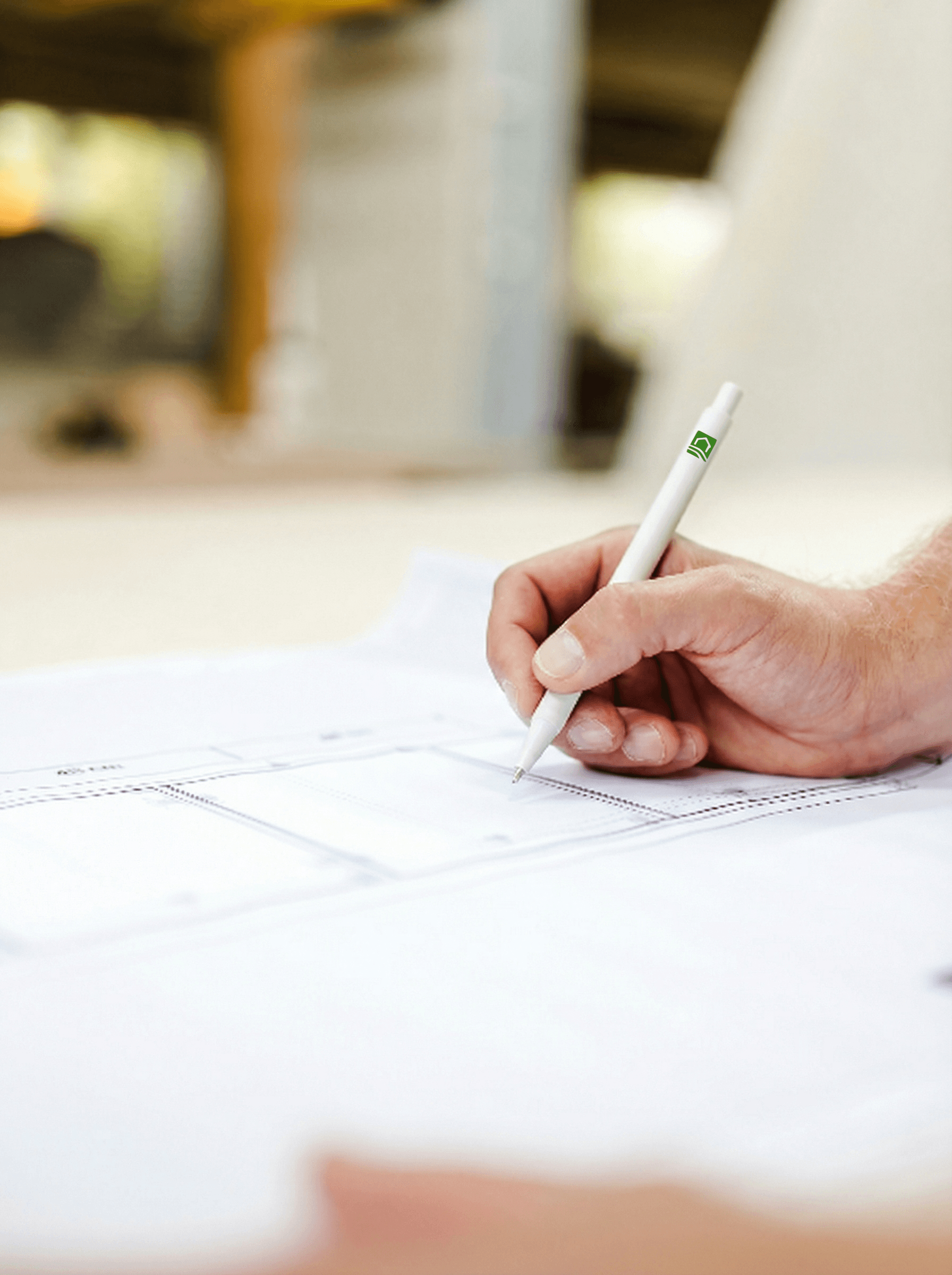 person writing on white paper