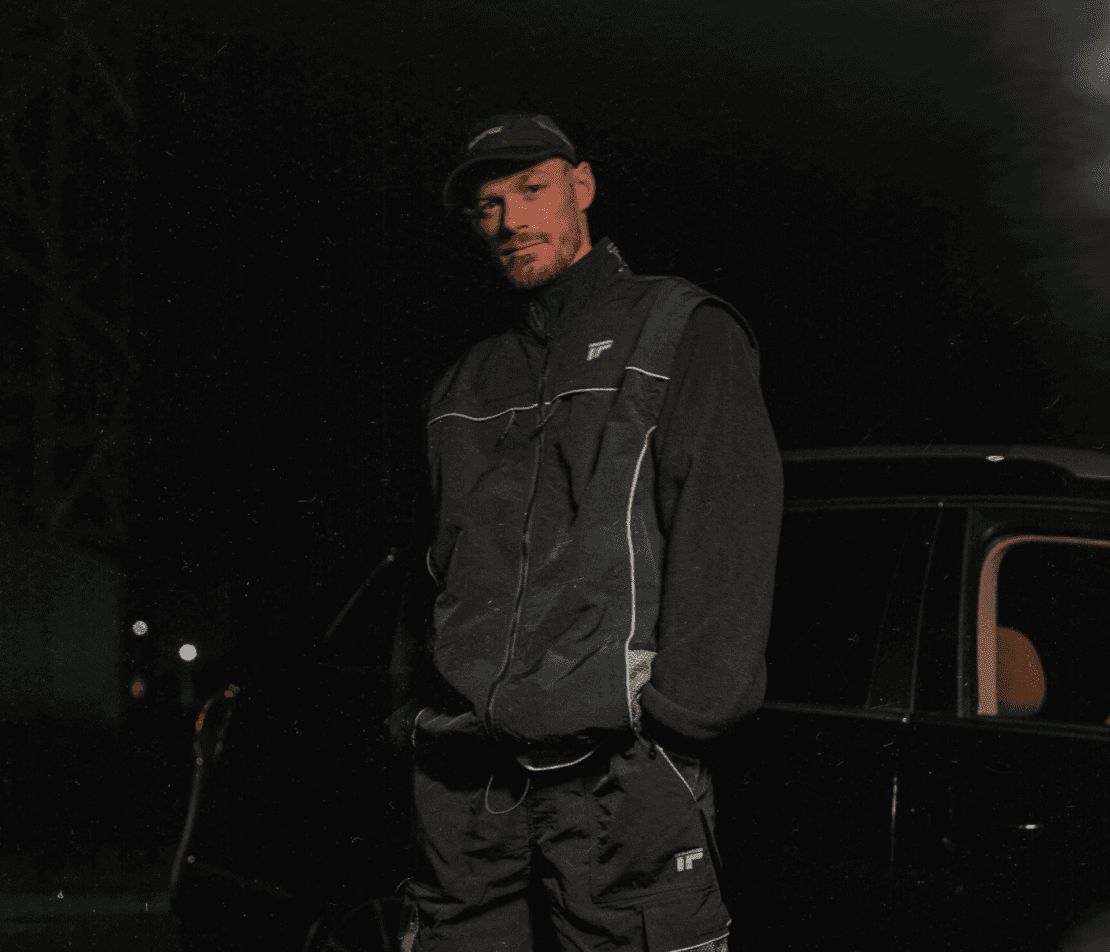 Athlete running on track wearing sportswear for peak performance lifestyle branding