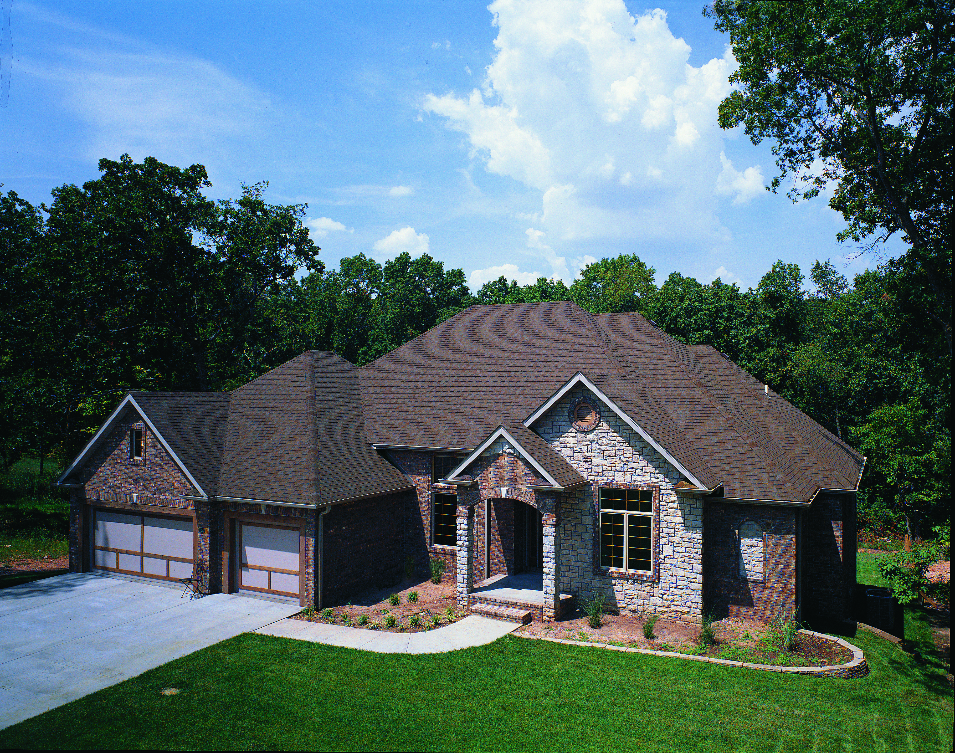 TAMKO manufacturer example of StormFighter FLEX shingles in Rustic Slate.