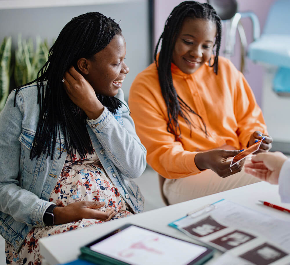 couple at doctor holding hands