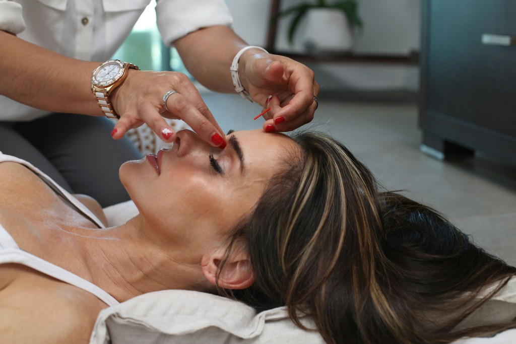 Lady receiving a face wax