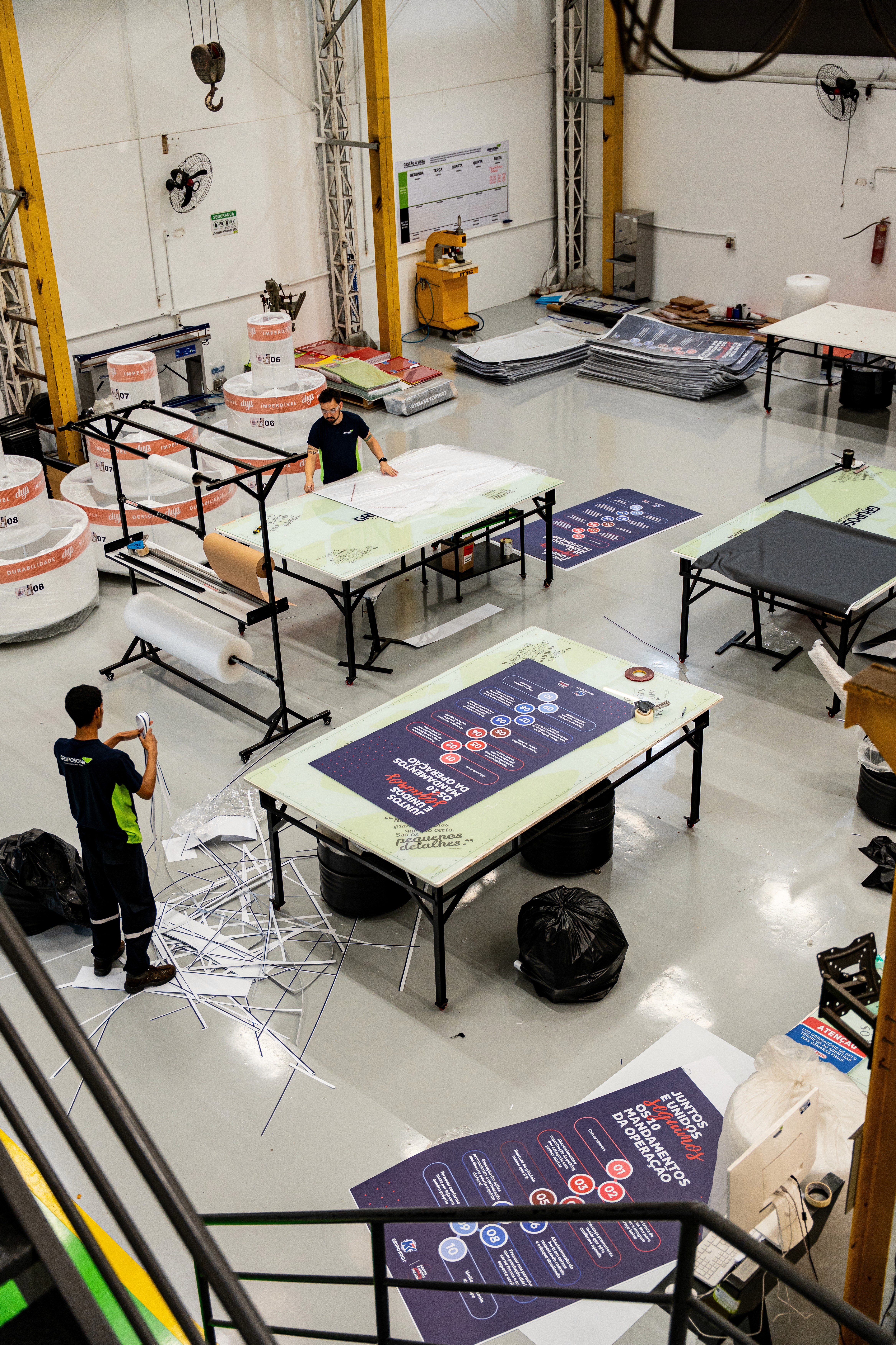 Documents and planning materials on a desk, representing customized solutions tailored to client needs.