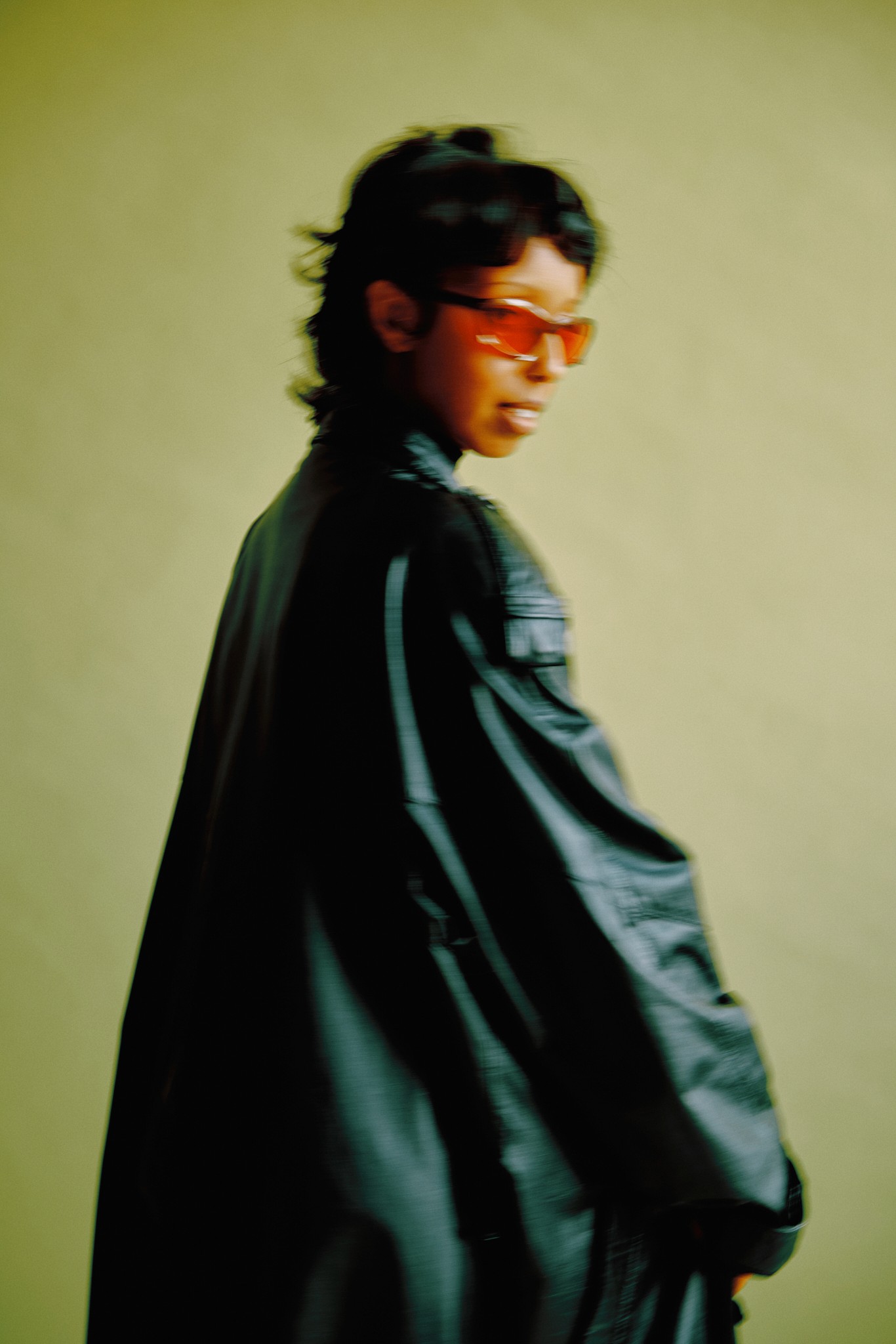 American flag flying against a cloudy sky
