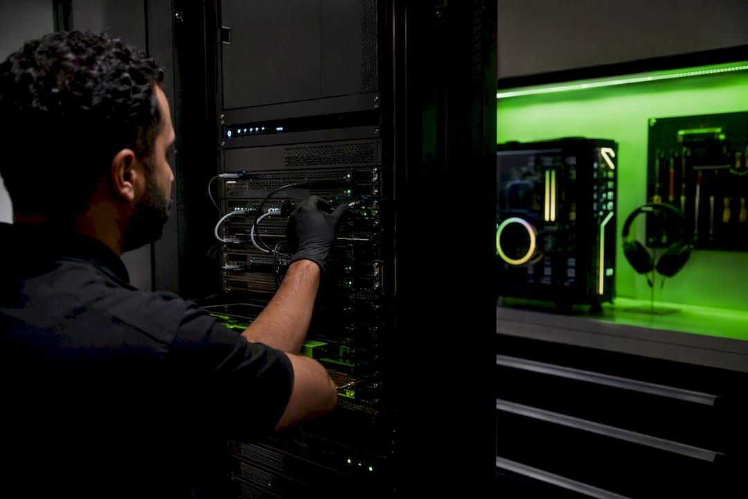 Hand adjusting cables on AI orchestration hardware