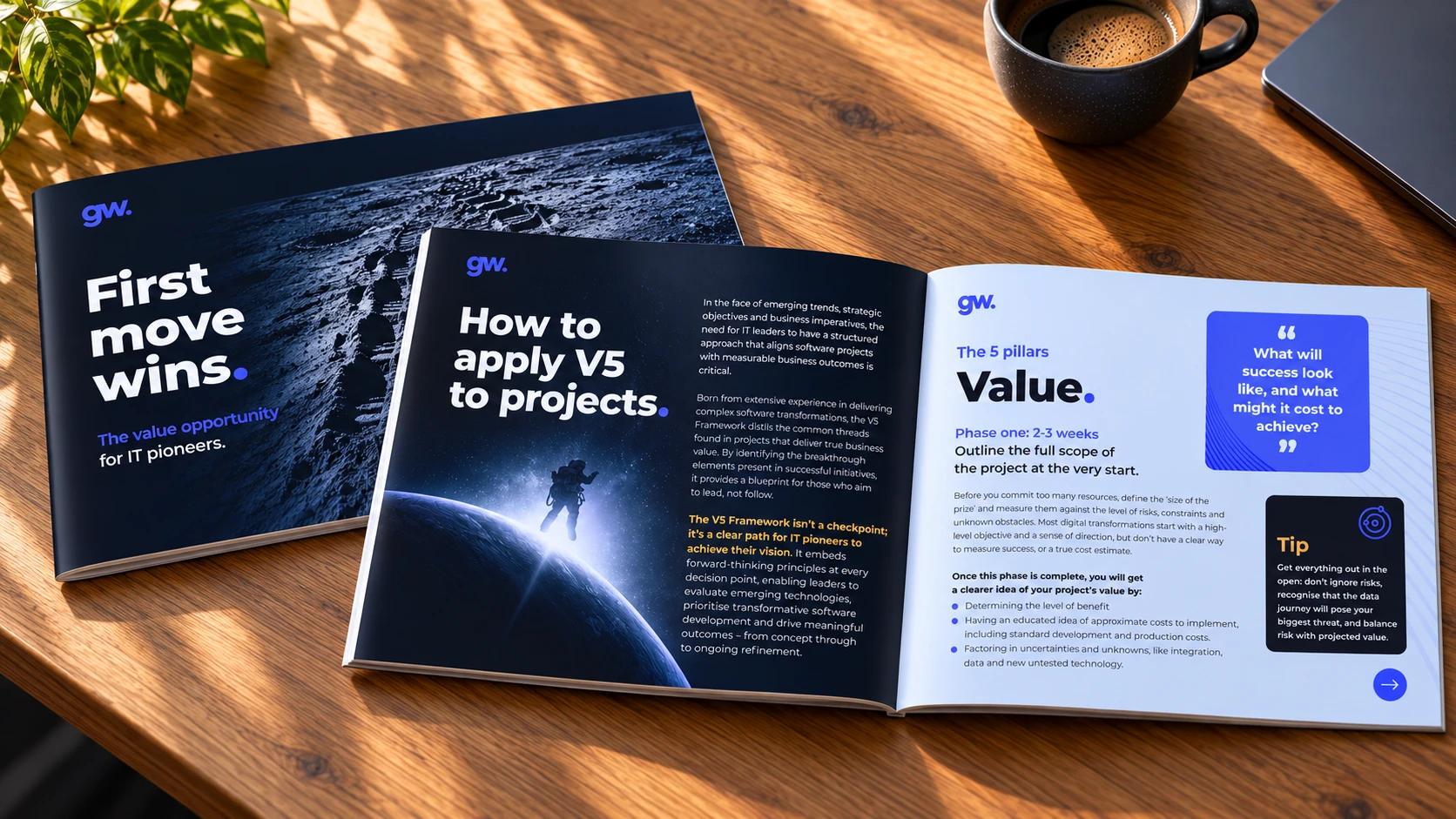 The V5 Framework whitepaper printed and open on a wooden desk, beside its cover