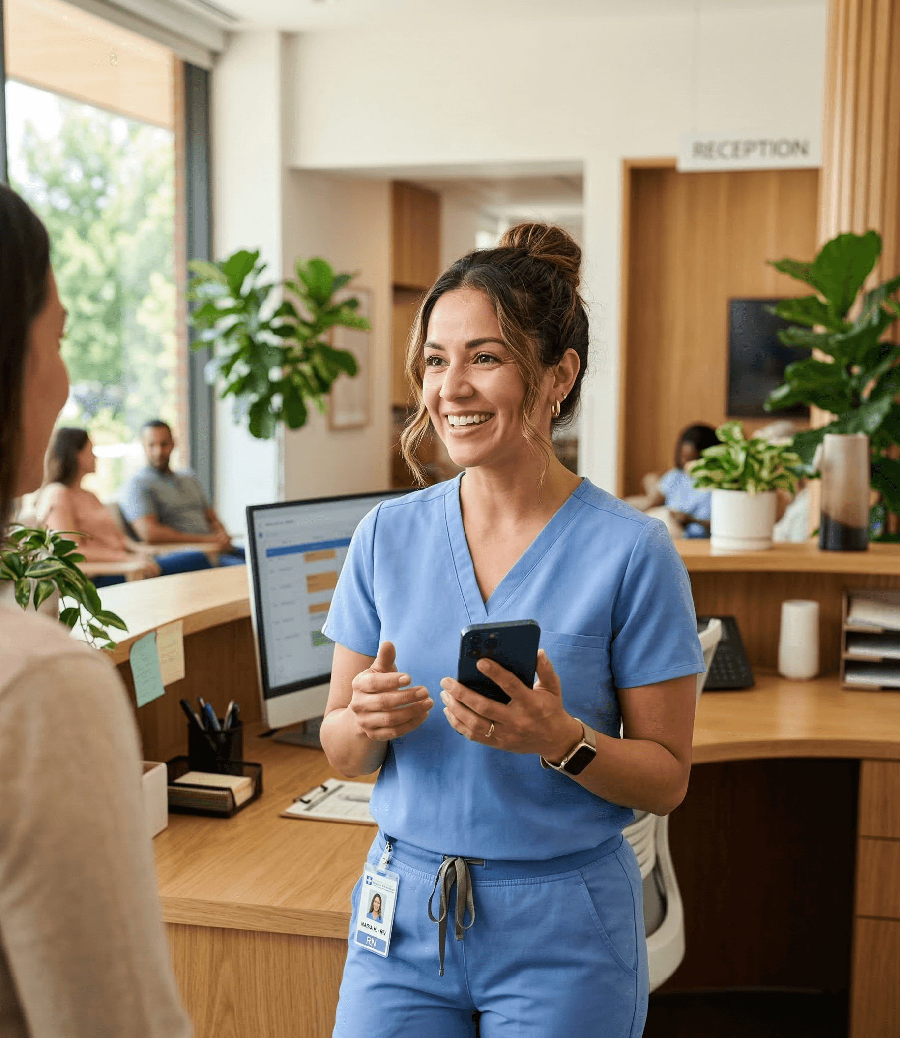 Healthcare receptionist using Cevi AI on mobile device at front desk
