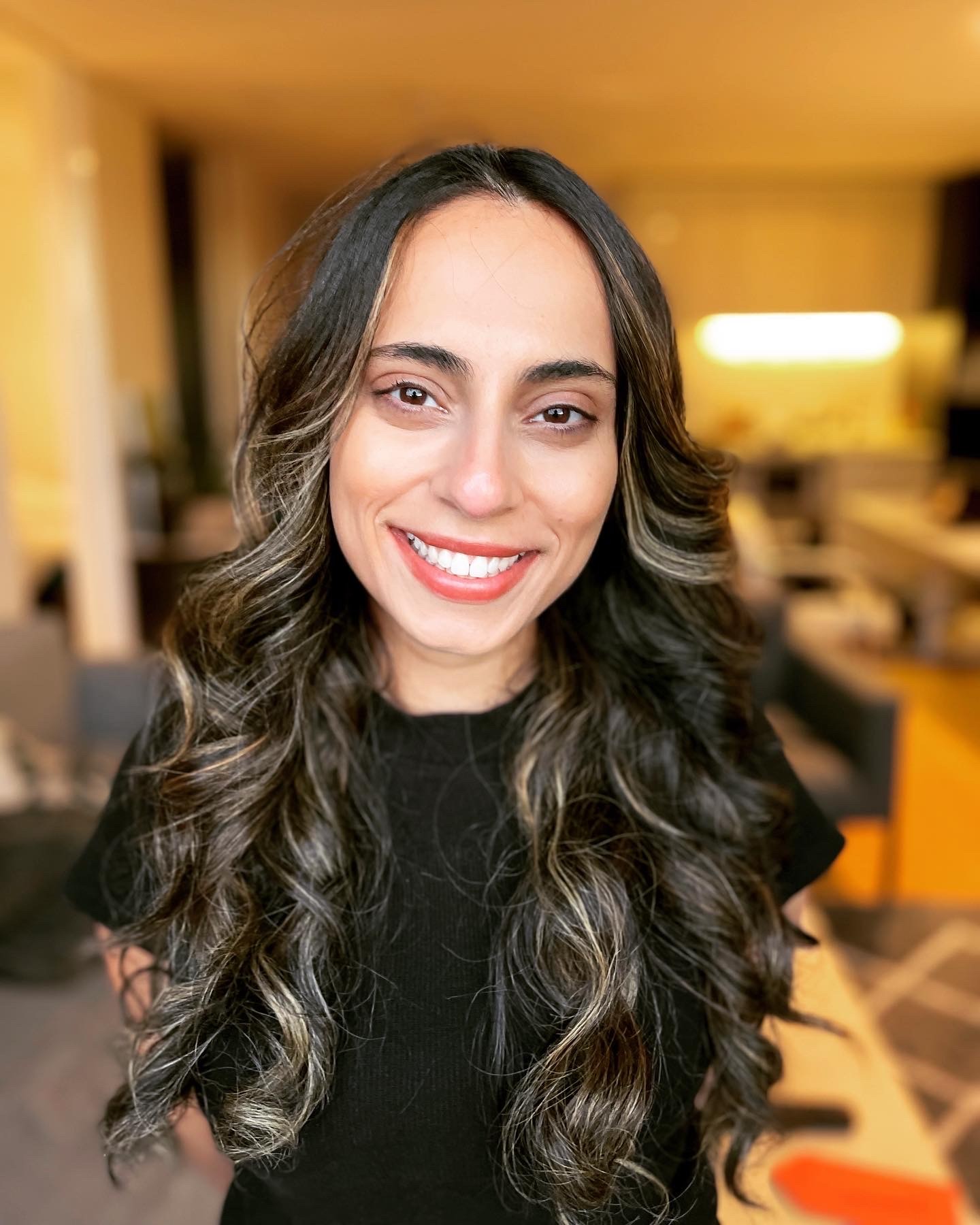 A photo of me laughing and looking away from the camera