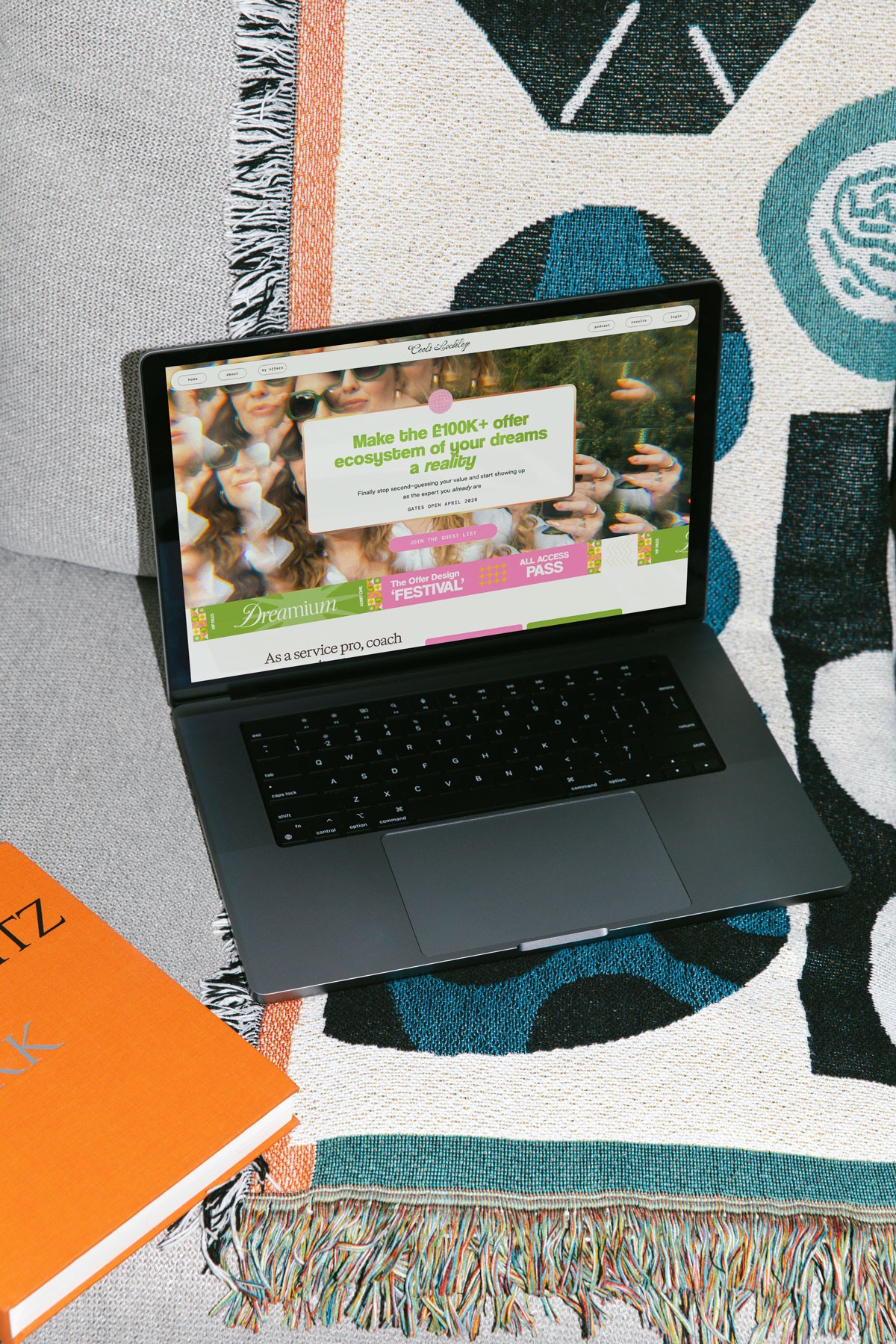 mockup of Dreamium sales page on a laptop