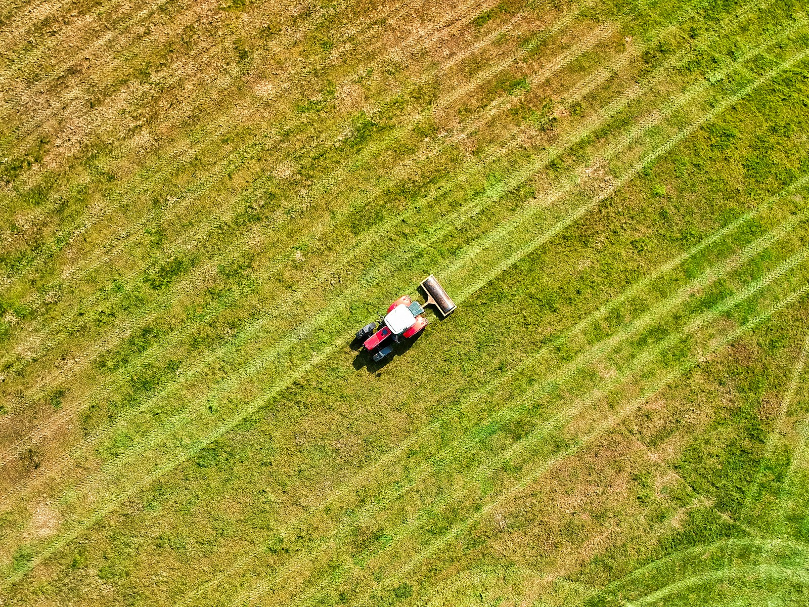 Agricultural drone flying over a green field