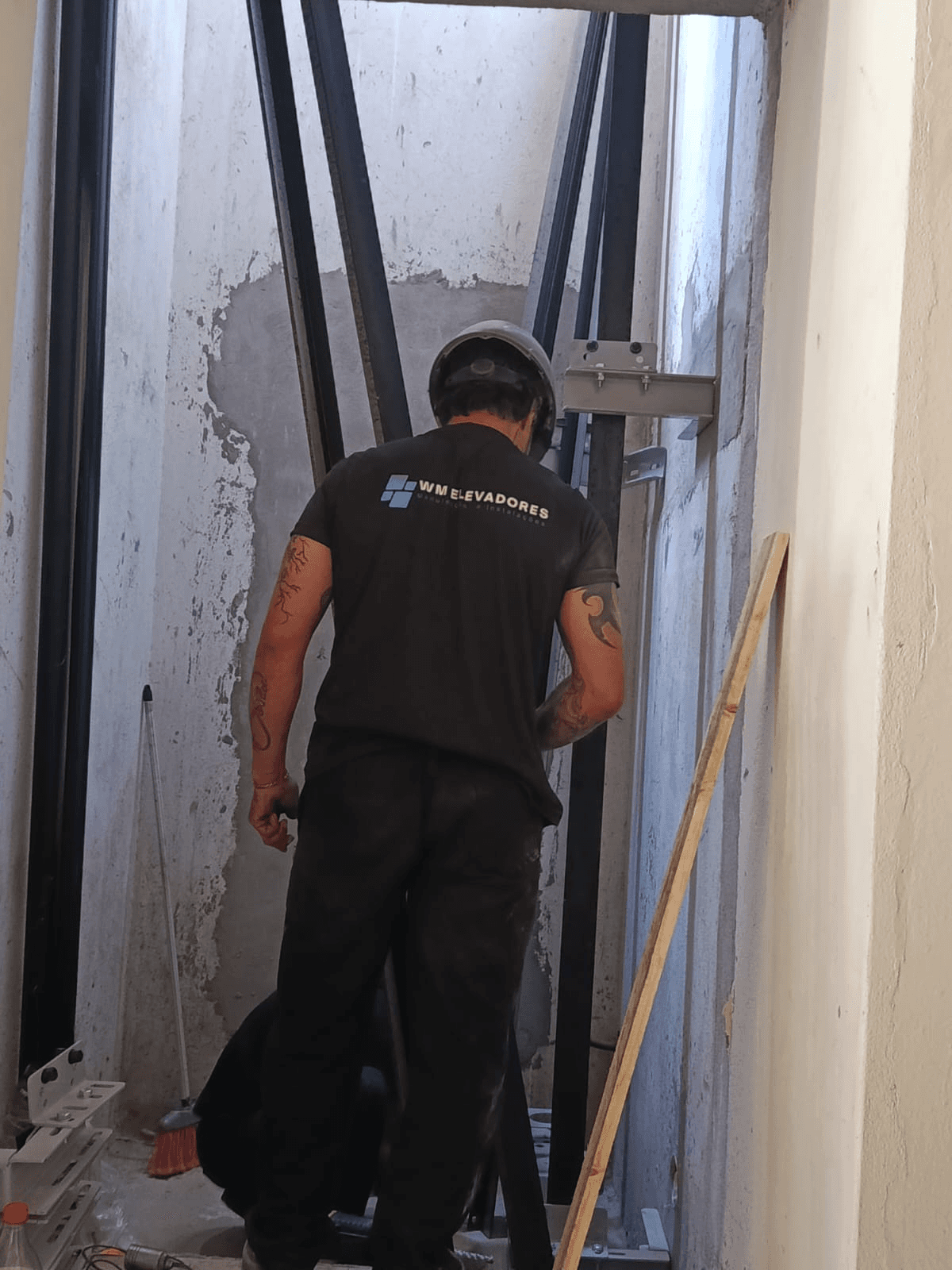 person sitting in a chair in front of a man