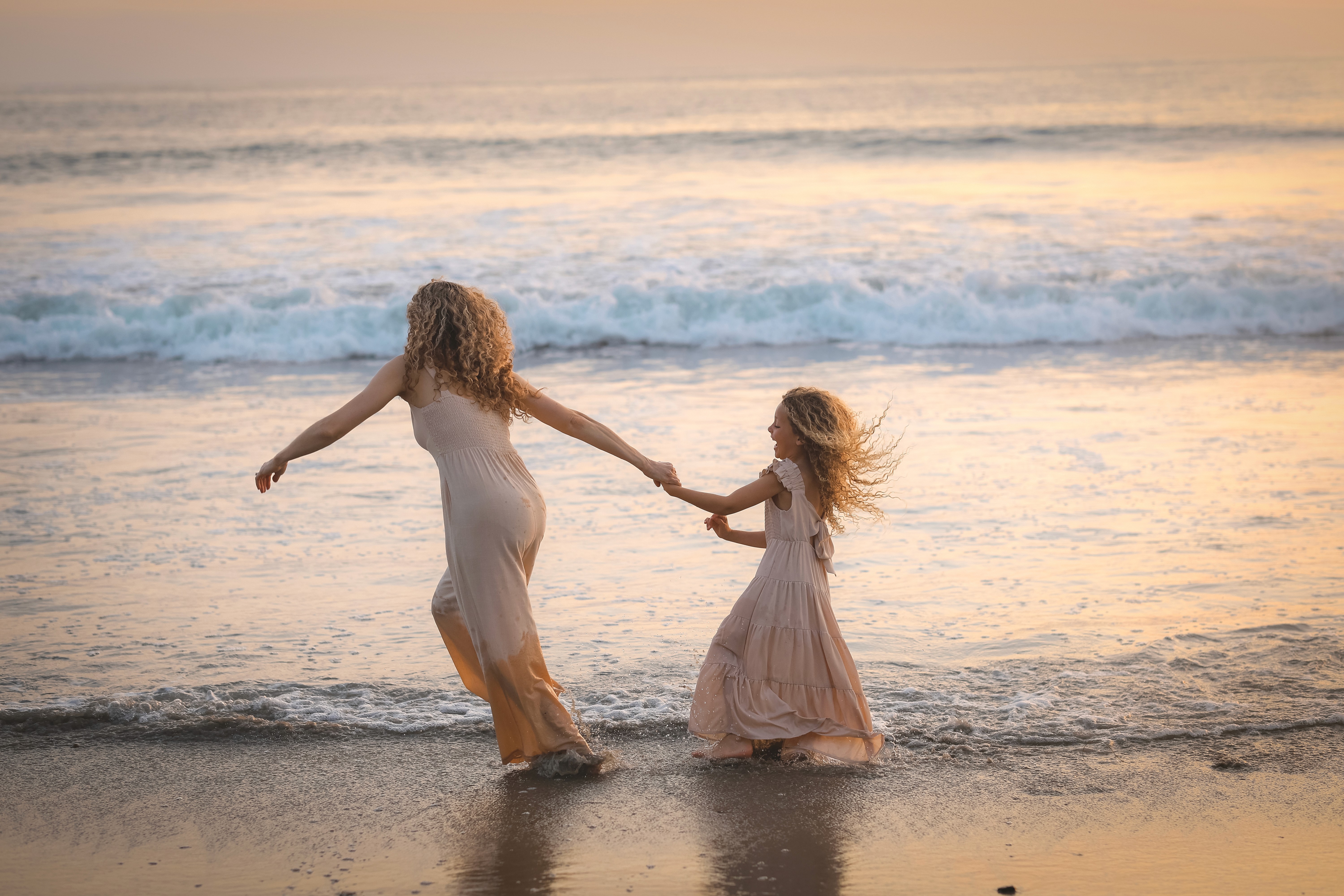 Family photoshoot at sunset on a San Diego beach