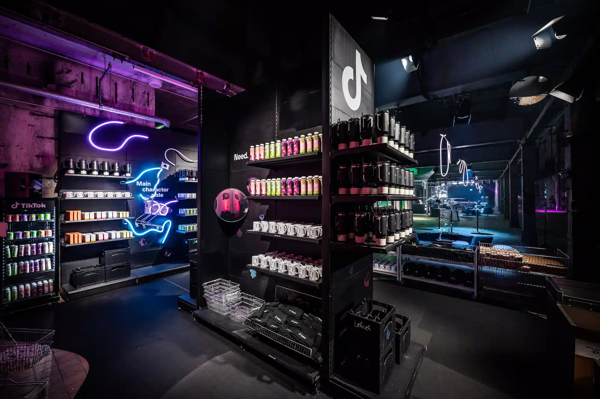 TikTok Awards – activation zone as an atmospheric merchandise shop with neon lighting and TikTok branding