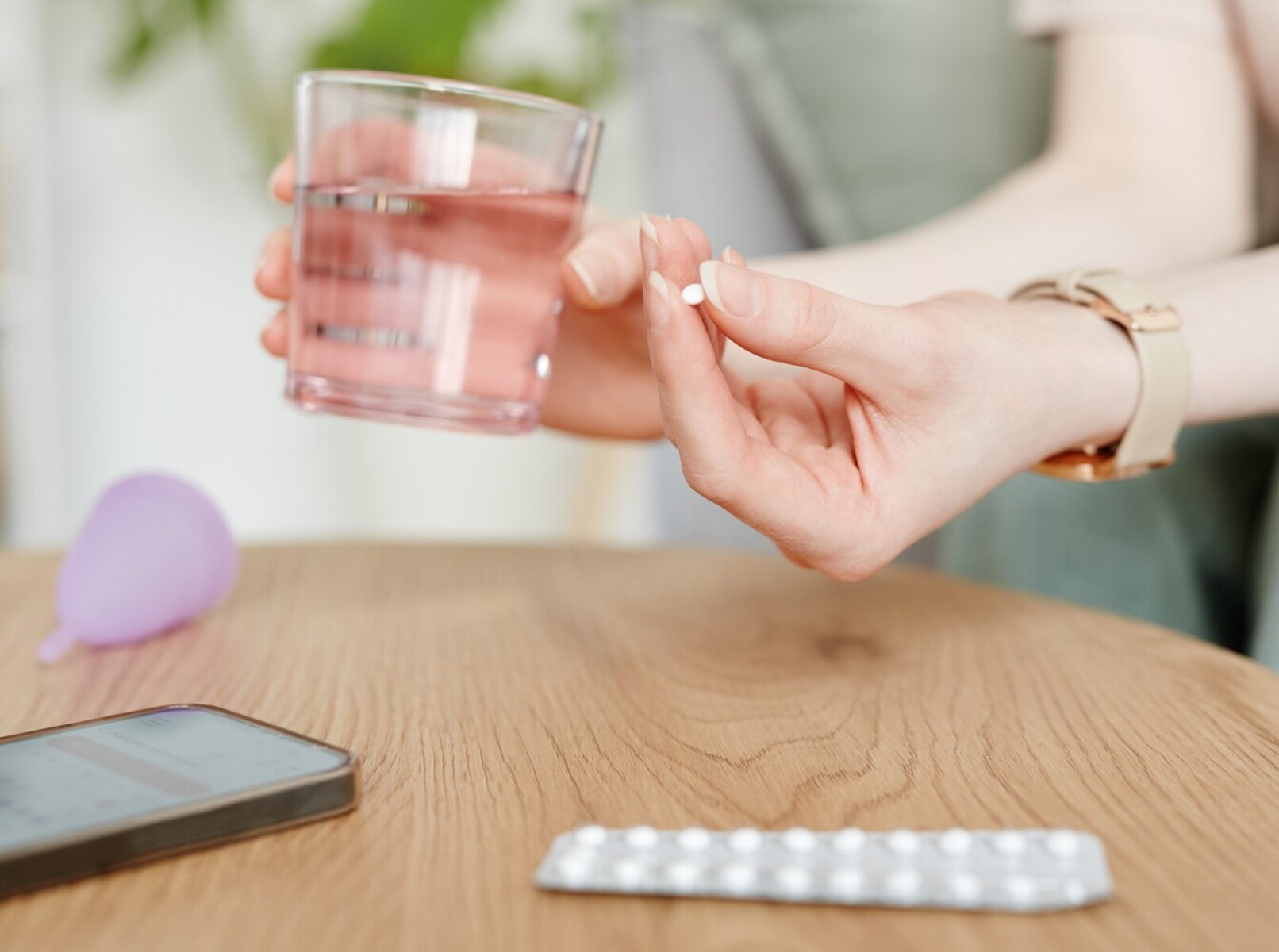 woman taking her birth control weight pill