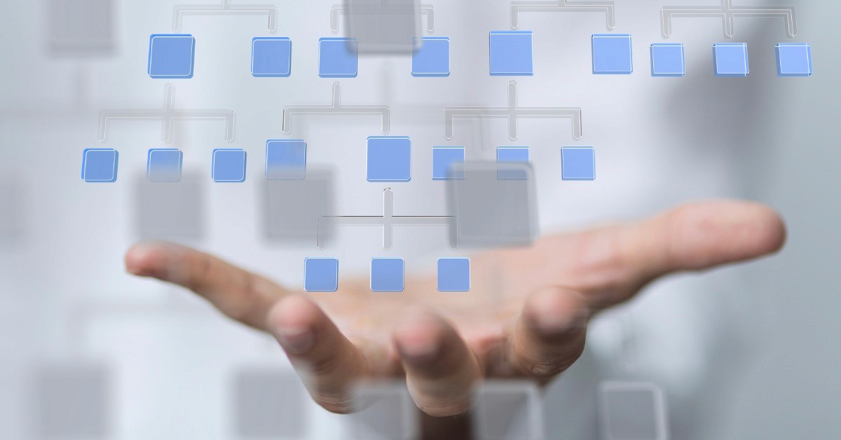 Open hand holding a connected hierarchy of structured data blocks, representing a website schemamap