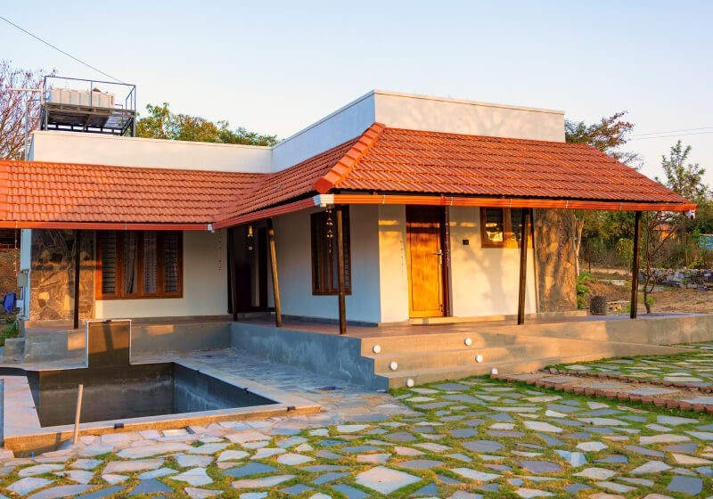 A flower-filled ring floats in fluffy clouds.
