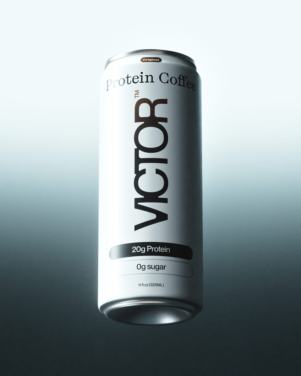 A can of coffee from VICTOR's brand against a blue and ligh gradient as a background.