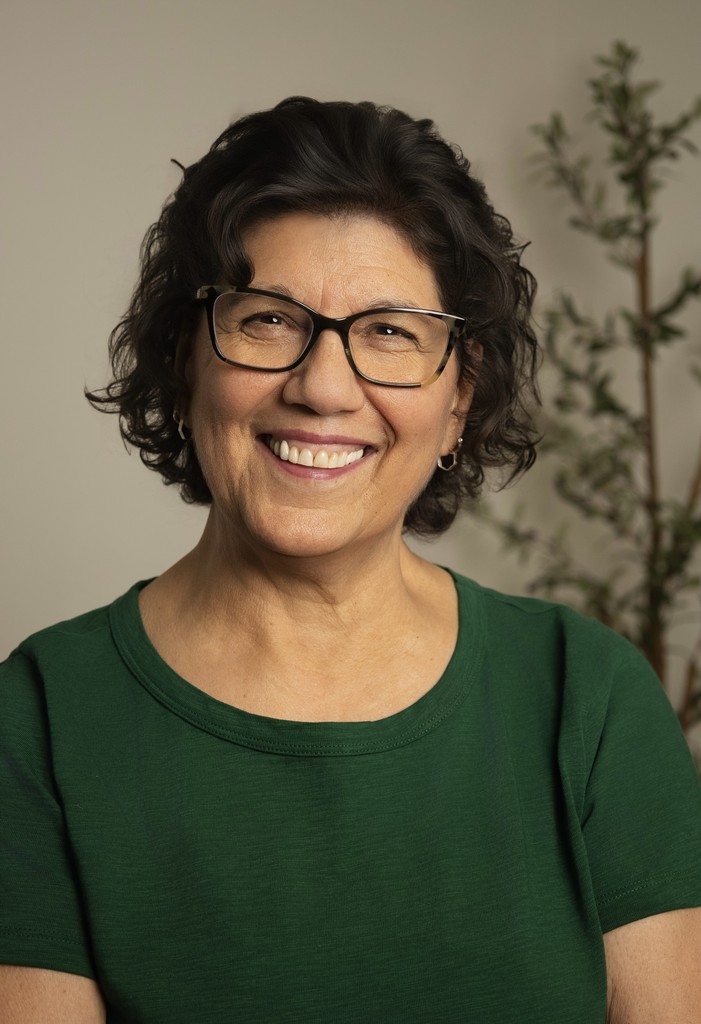 Carol Bruce, founder of Wellness Matters, smiling warmly—encouraging self-discovery, balance, and growth.
