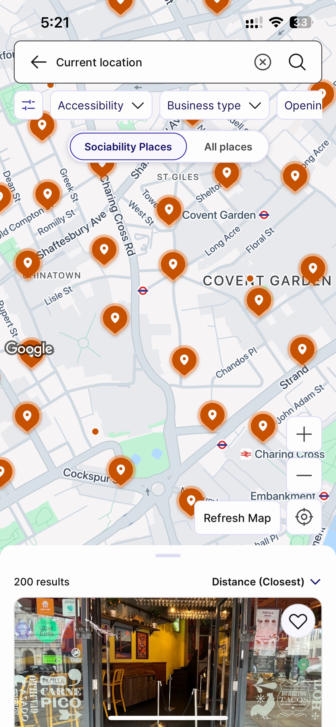 Sociability app displaying a map of central London with orange pins marking places that have accessibility information.