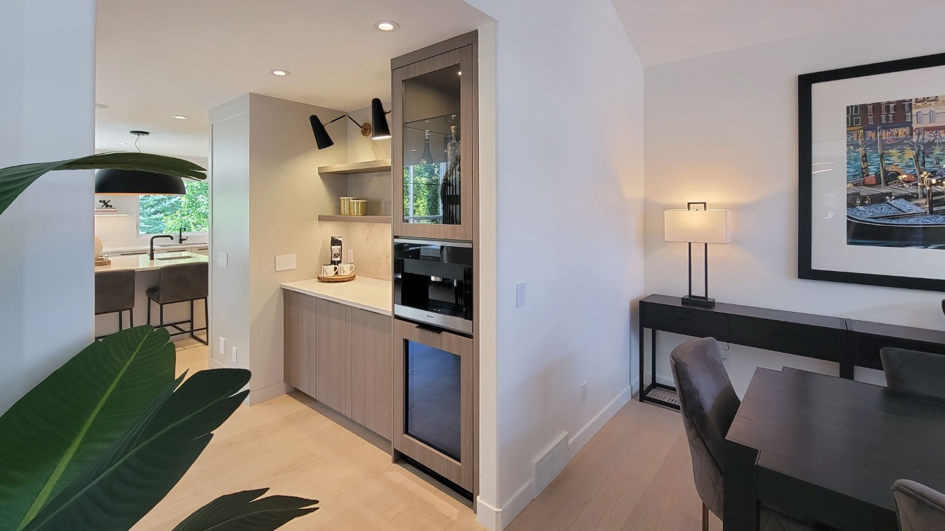 Image of Modern kitchen and dining area with layout design, furniture, KHD Homes interior design and construction expertise.