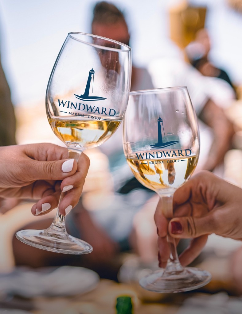 WIne glasses clinking winwards marina logo