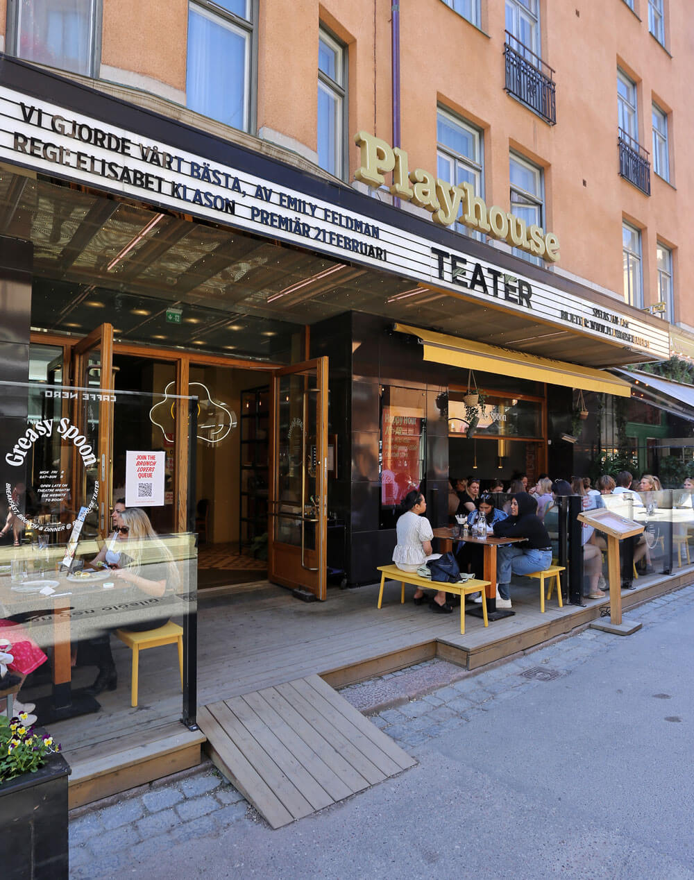 Shop front of the Greasy Spoon restaurant in the city