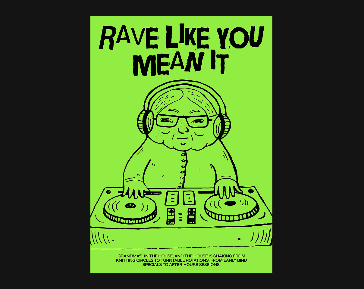 A close-up of a hand wearing multiple decorative rings against a blue background.