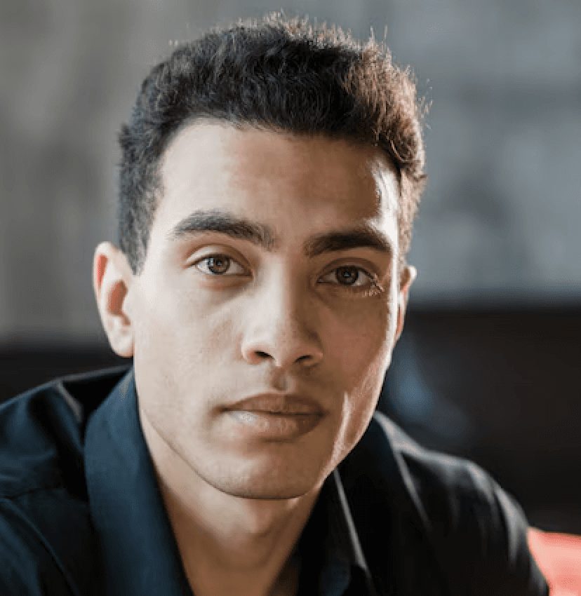 smiling woman wearing white and black pinstriped collared top
