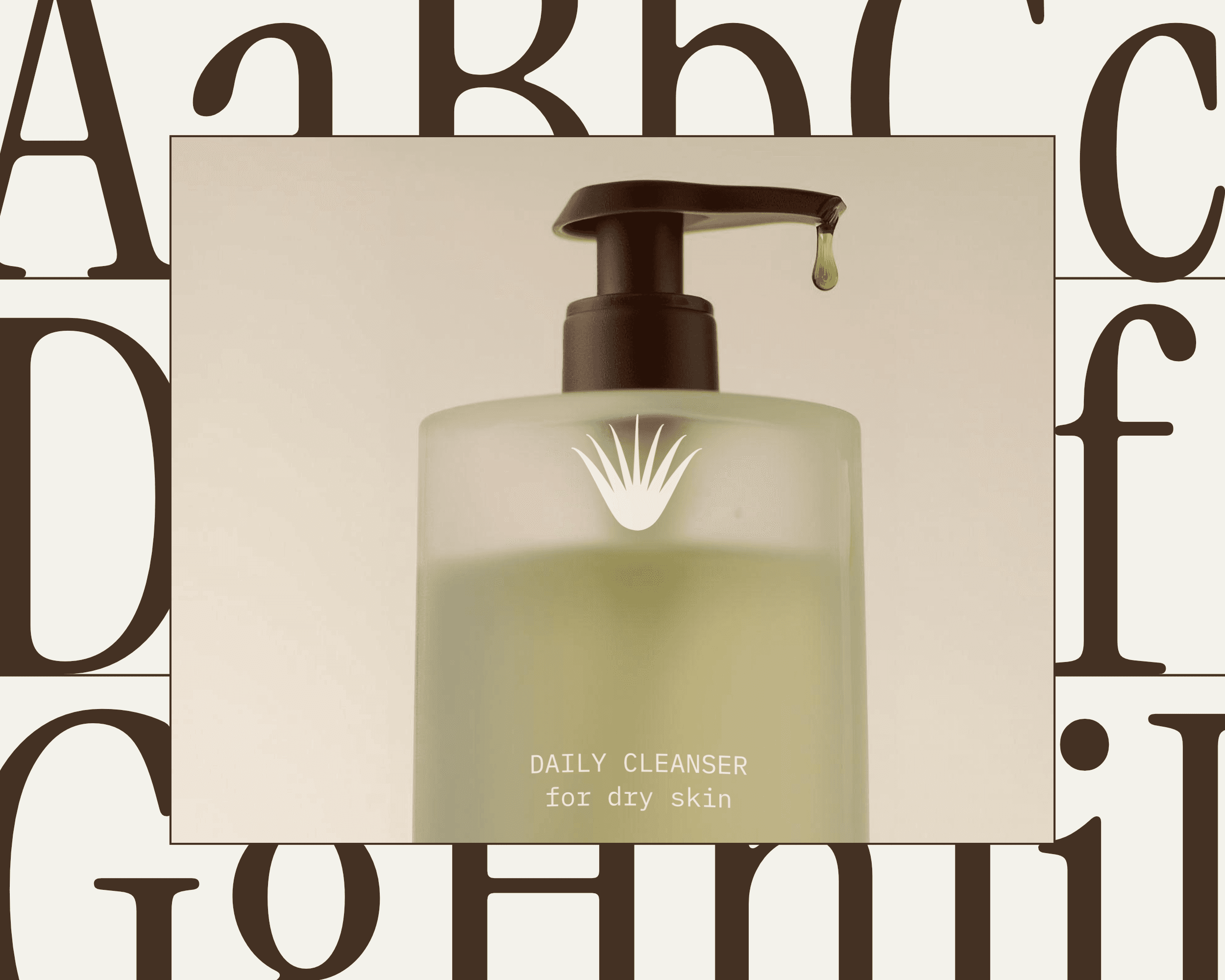 A photo of a packaging bottle design for the skincare brand VÉRA Botanicals with some decorative typography used as a background.