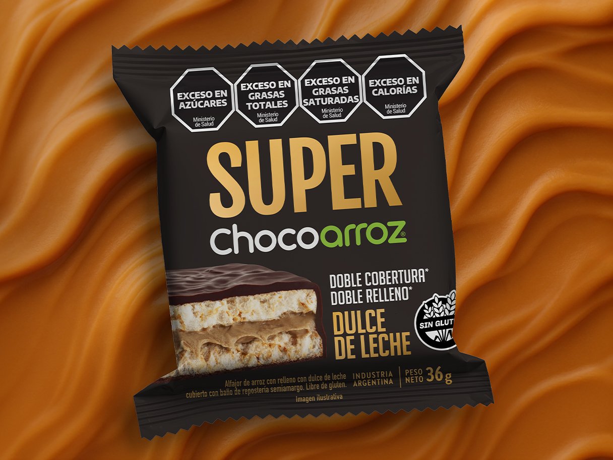 Rooftops of a coastal town with the sea in background