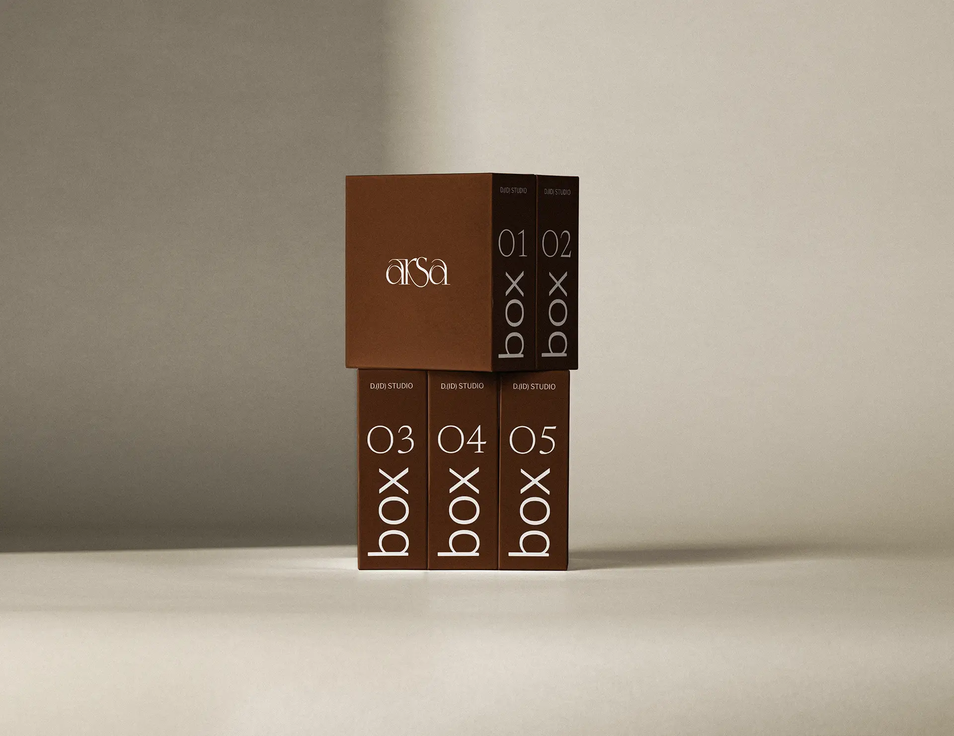 Packaging design for Arsa clothing brand showing branded product boxes
