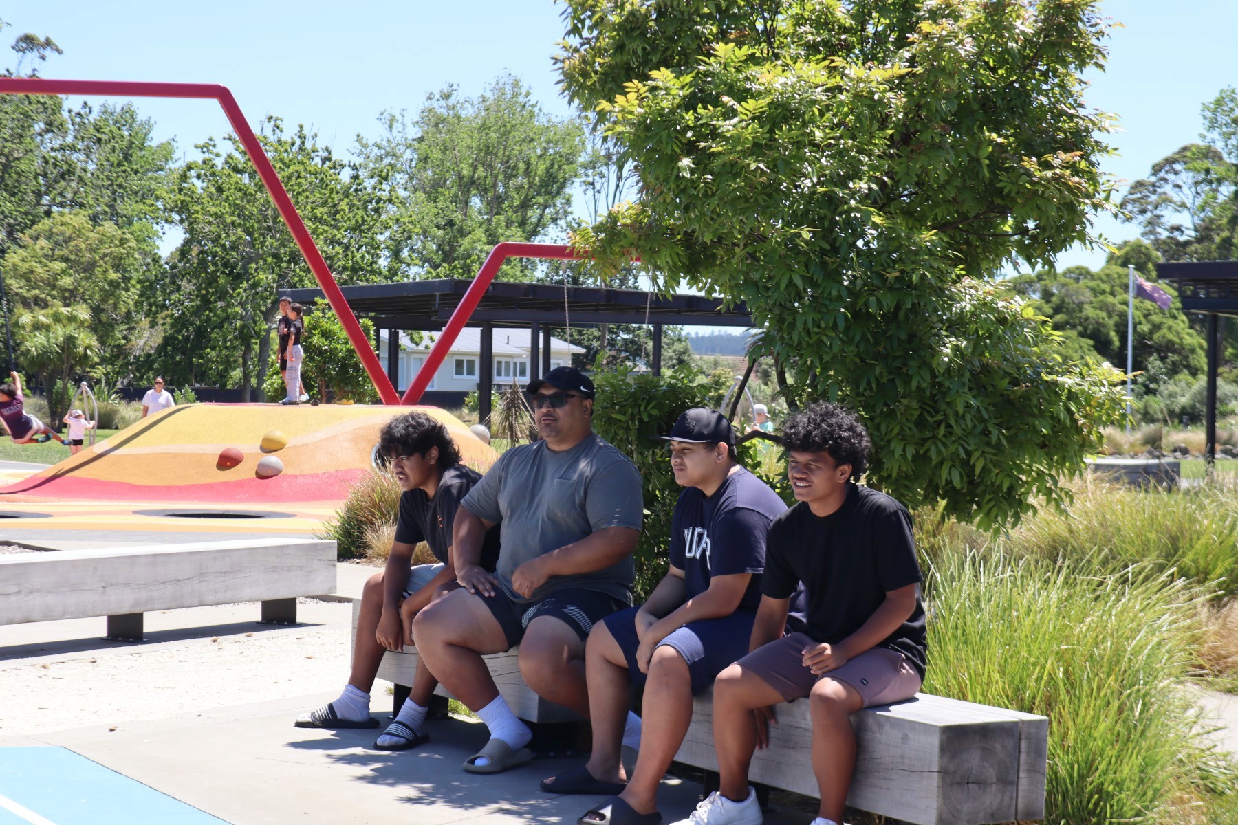 Herb and Kids Sitting in Shade
