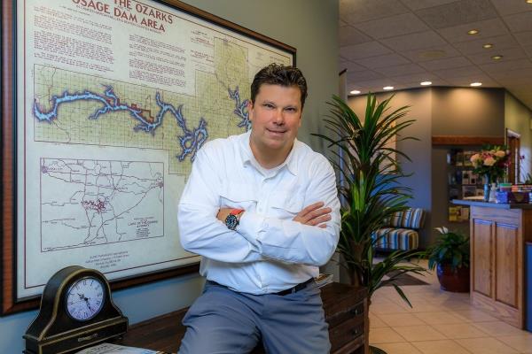 a man smiling for the camera