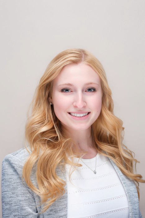 african american woman corporate headshot in photography studio