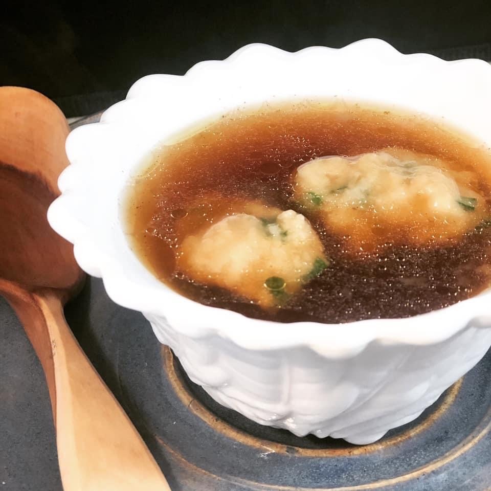 Students identifying and sorting edible wild plants as part of a foraging certification course.