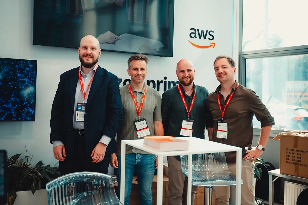 Amazon Polska and AWS event stand, team at the display counter