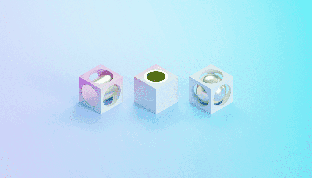 Three white 3D cubes with spheres on a pastel gradient, representing Shopify Plus tools and resources