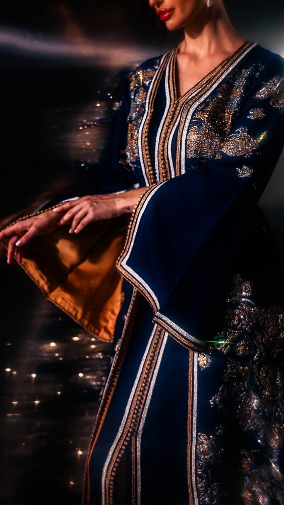 Black Moroccan caftan with gold hand embroidery, elegant handcrafted couture piece prepared in Bahrain