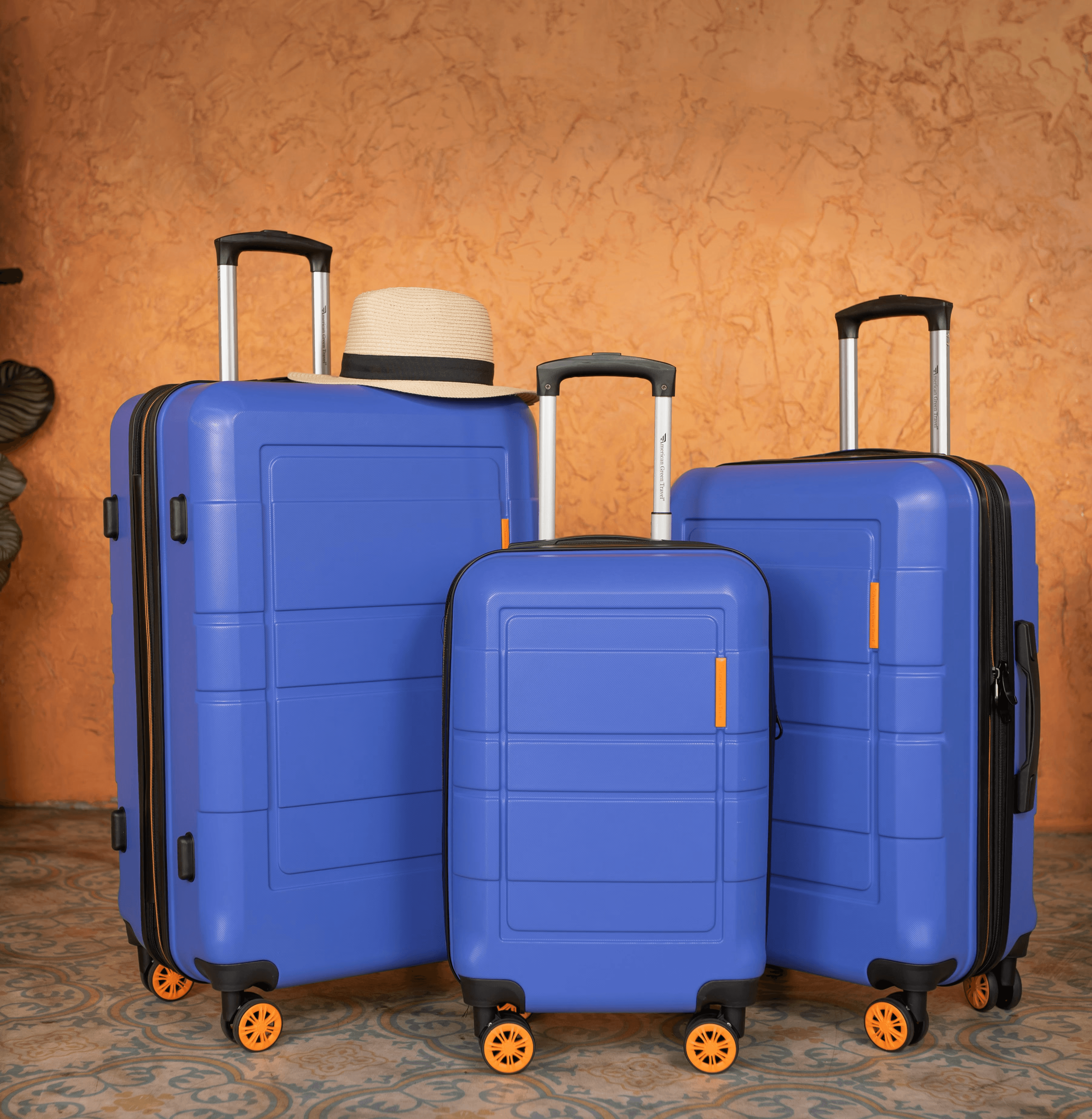three pieces of blue luggage sitting next to each other