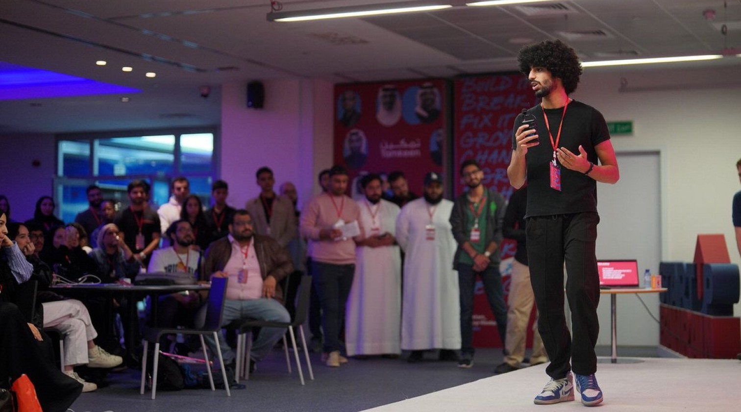 Photo of Hadi Aradi giving a presentation