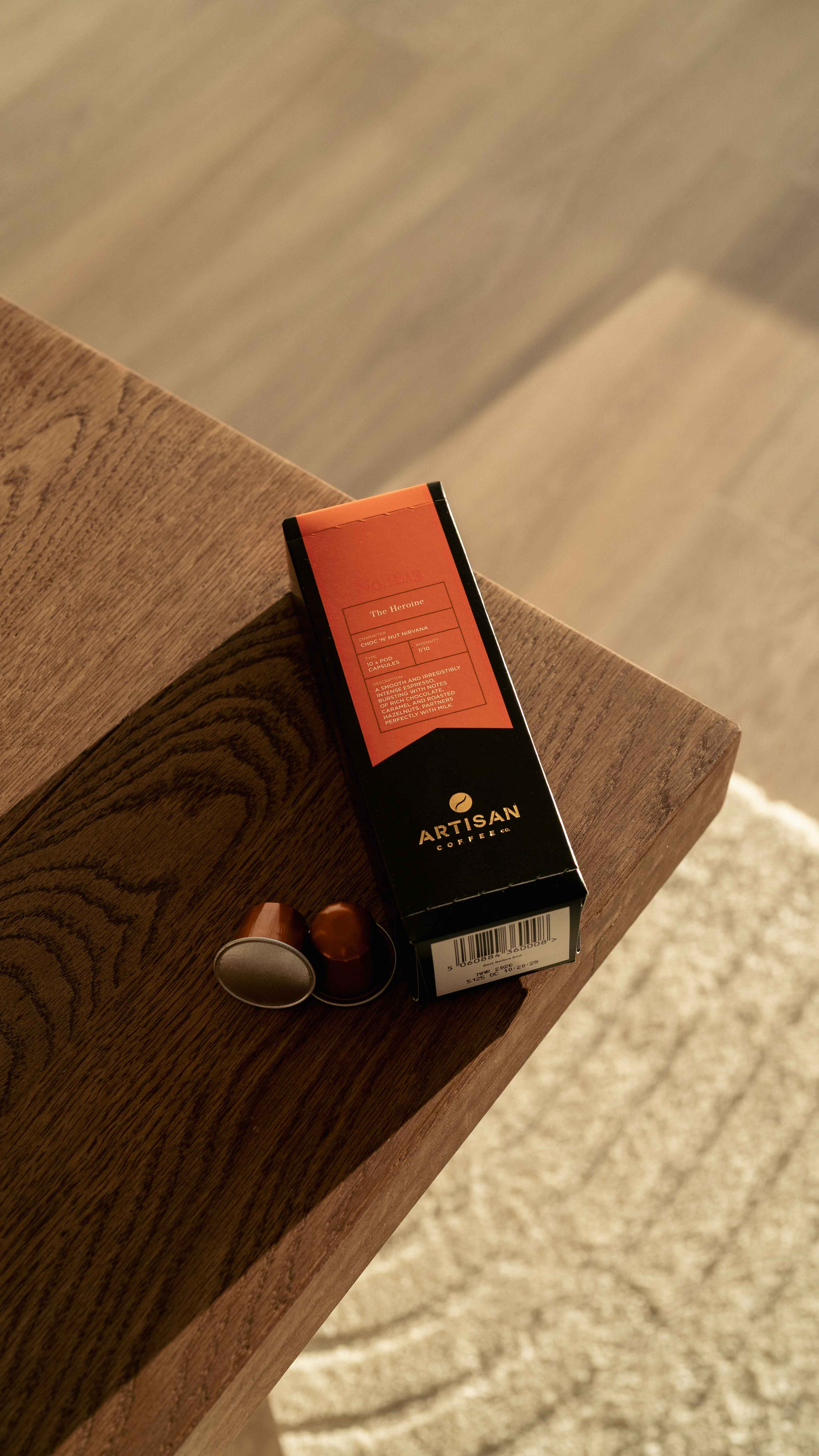 2 kids playin near a green car