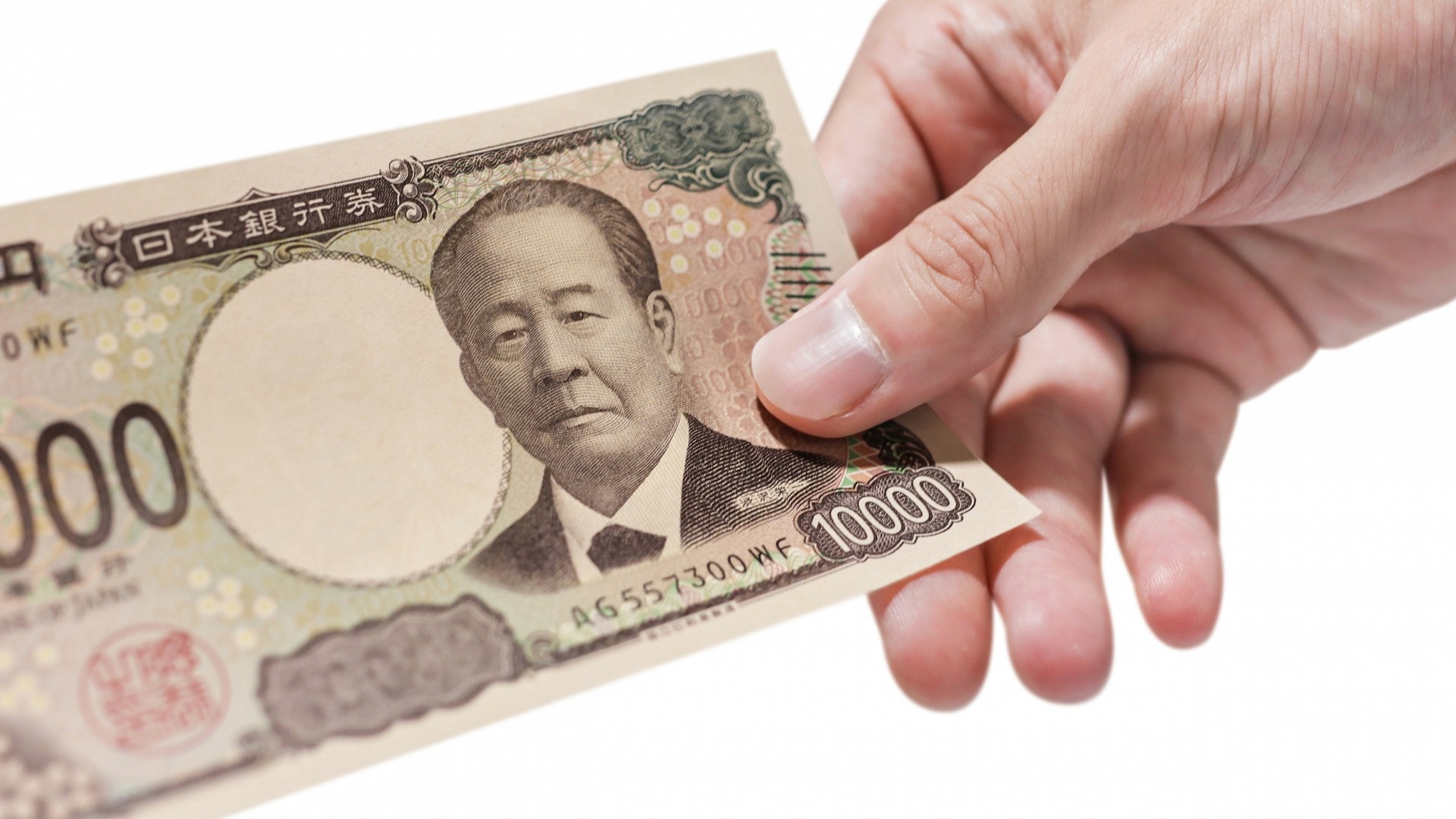 一万円札を持つ手