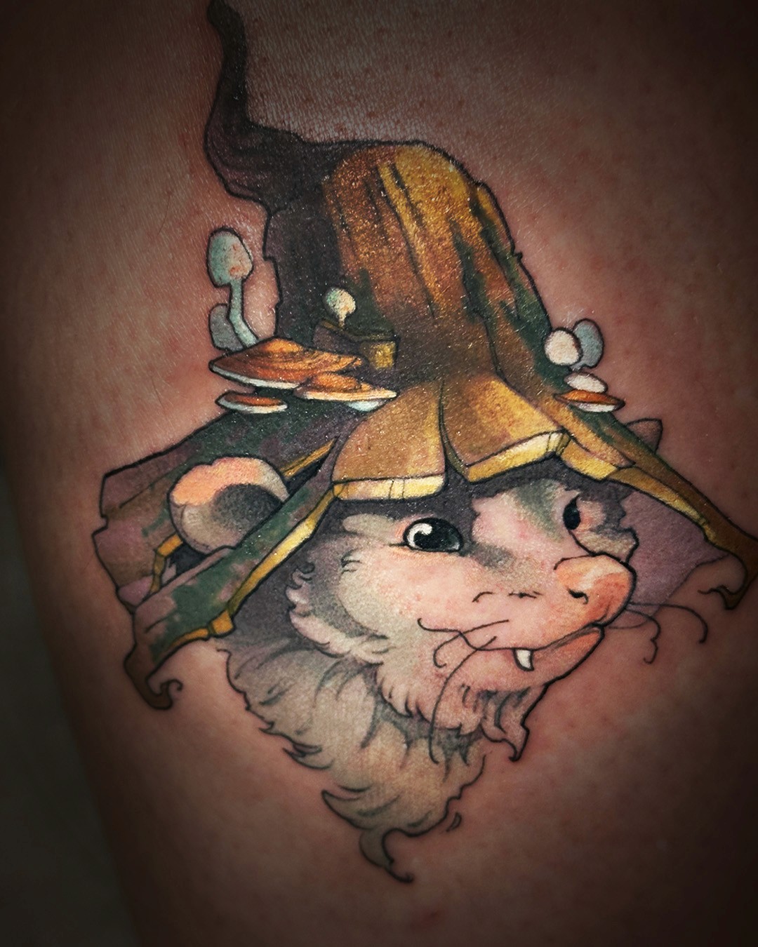 Neo traditional tattoo of a opossum wearing a hat by harper clark
