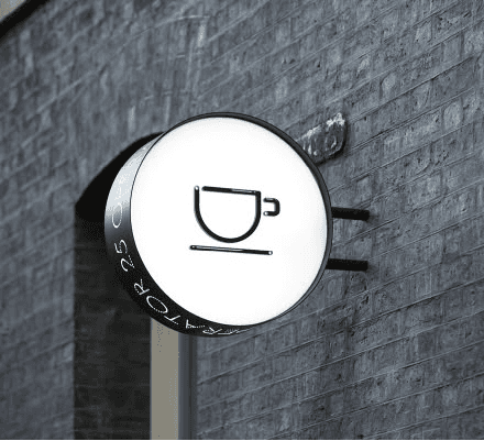 enseigne drapeau rond éclairé