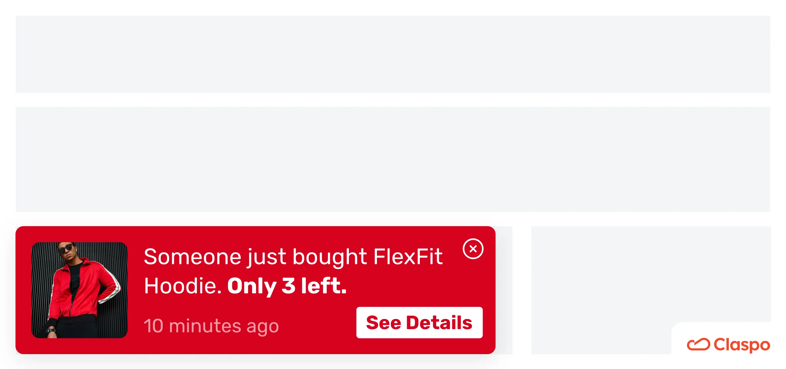 A website popup showing a small, red sales notification popup in the bottom right corner with a recent purchase alert