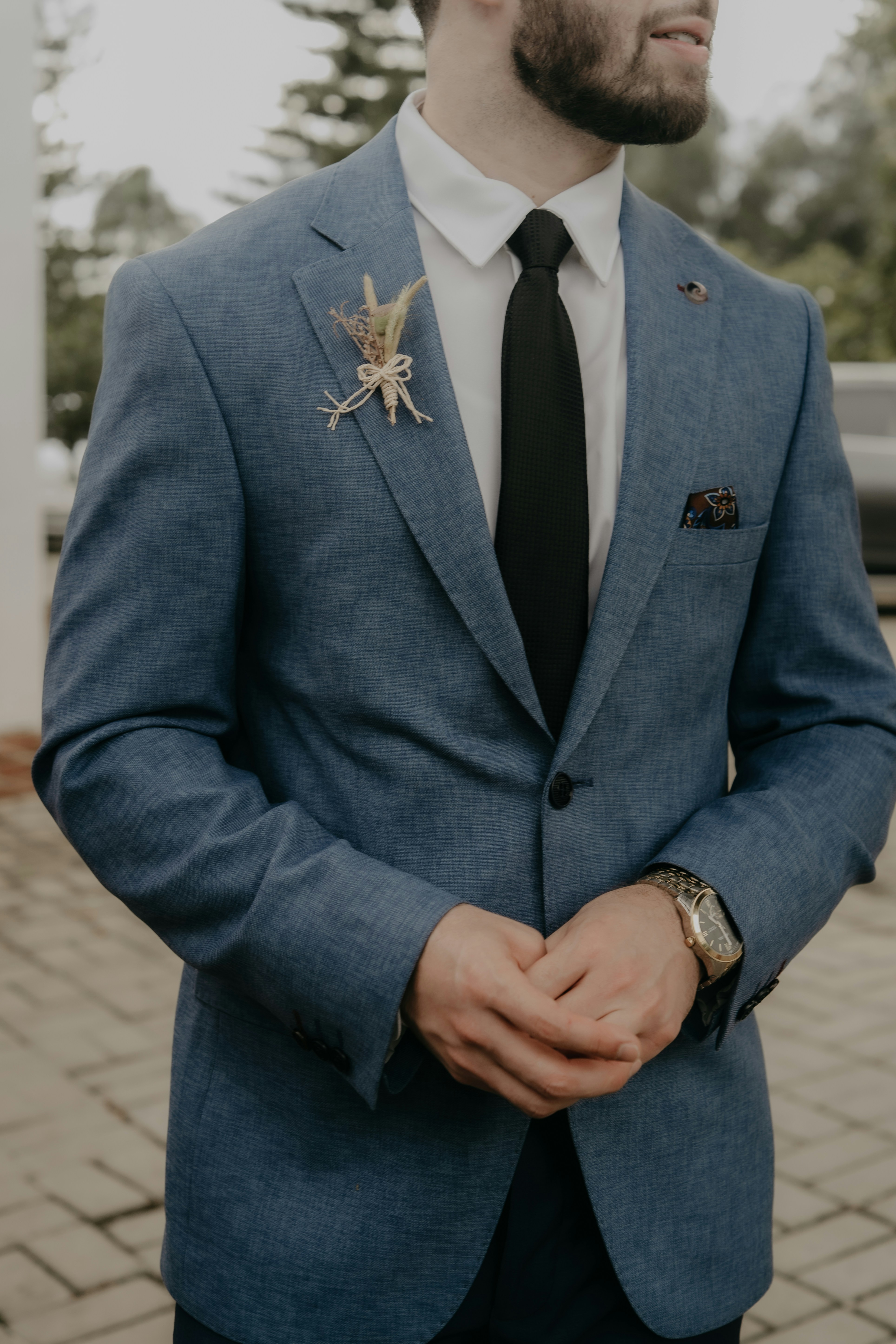 a man in a blue suit and tie